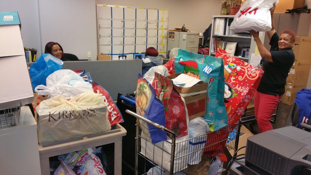 Volunteers collect Angel Tree Gifts